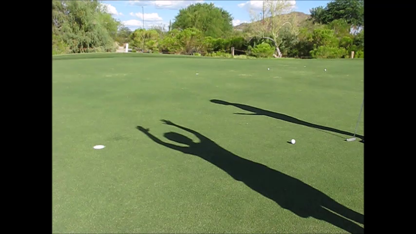 Where to stand so we do not cast a shadow over fellow golfer's putting line